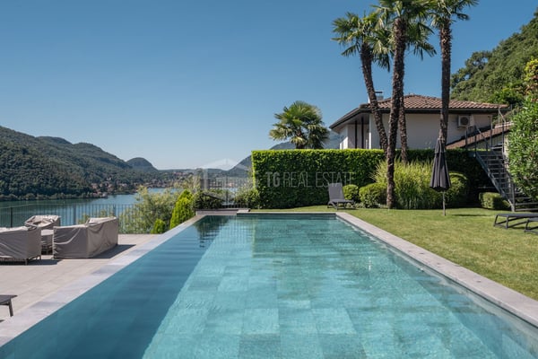 ELEGANTE APPARTAMENTO DI 4 LOCALI CON GIARDINO E VISTA LAGO 19