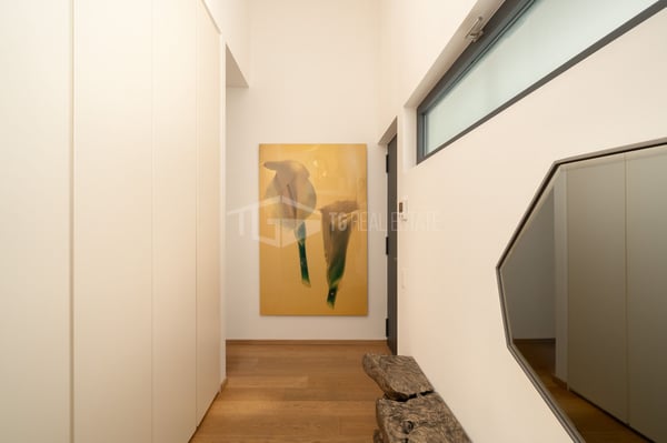 ELEGANTE APPARTAMENTO DI 4 LOCALI CON GIARDINO E VISTA LAGO 14