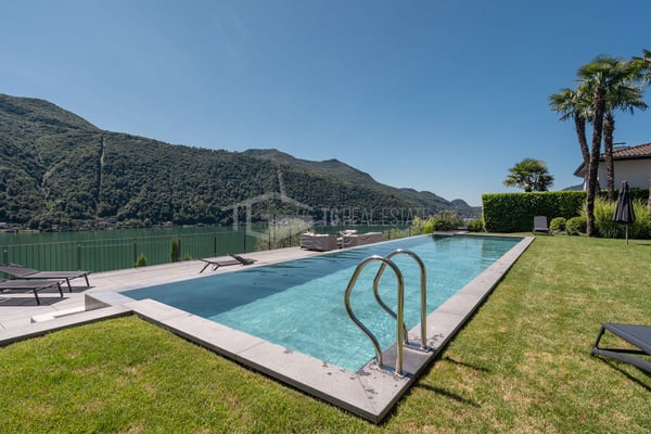 ELEGANTE APPARTAMENTO DI 4 LOCALI CON GIARDINO E VISTA LAGO 18