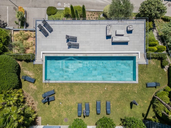 ELEGANTE APPARTAMENTO DI 4 LOCALI CON GIARDINO E VISTA LAGO 16