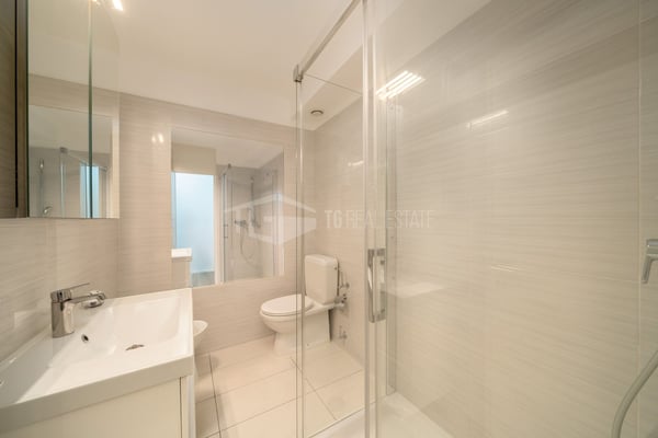 DUPLEX CON GIARDINO IN CENTOR LUGANO 12