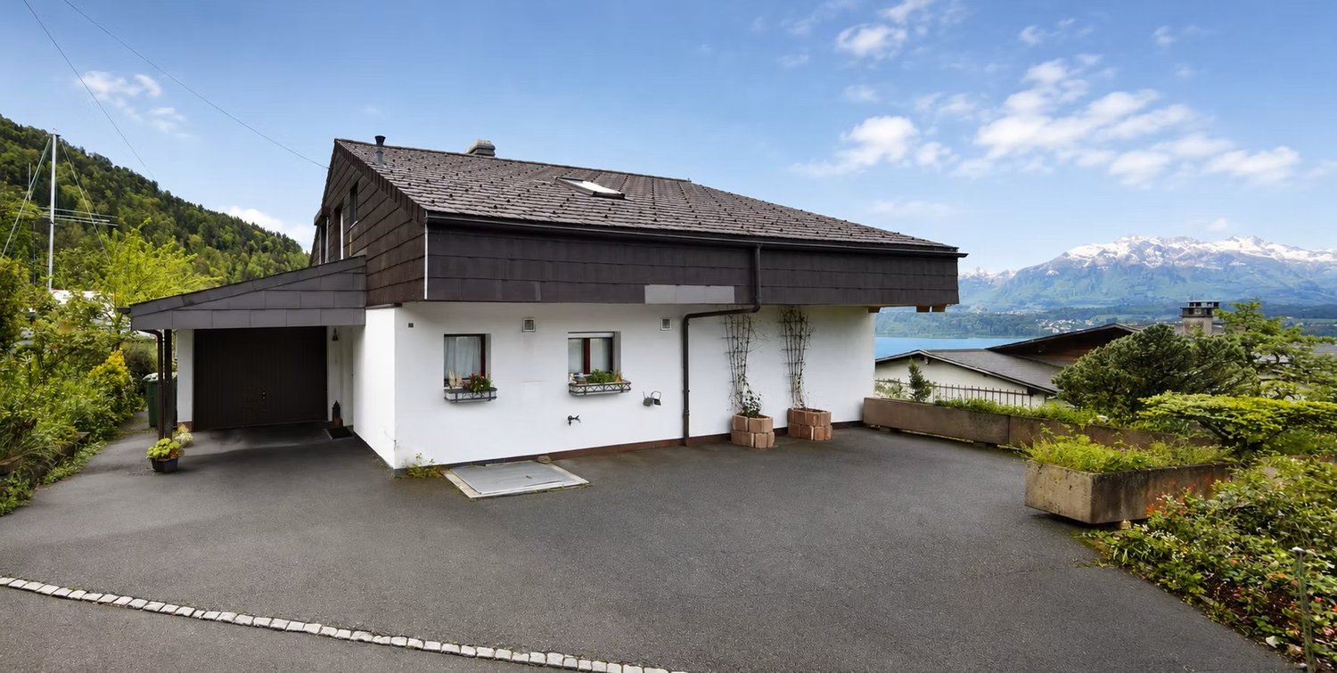 Immobilie in Oberhofen Am Thunersee - Charmantes Einfamilienhaus mit Studio und traumhafter Seesicht – Wohnen über dem Thunersee - Bild 11