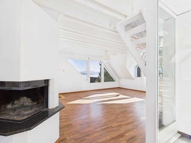empty room, wooden floor, white walls, fireplace, glass windows, glass door