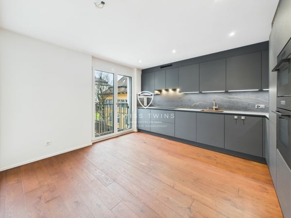 Urbaner Luxus trifft Ruhe - Stilvolle 1.5-Zimmer-Wohnung mit CarLift 19