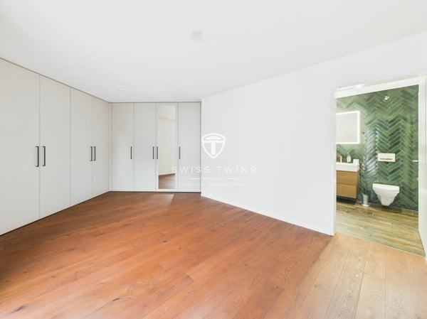 Urbaner Luxus trifft Ruhe - Stilvolle 1.5-Zimmer-Wohnung mit CarLift 13