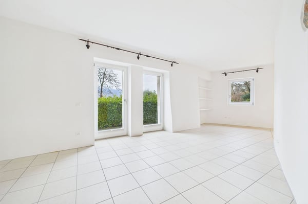 Duplex elegante con vista lago a Carona | Stilvolles Duplex mit Seeblick in Carona 1