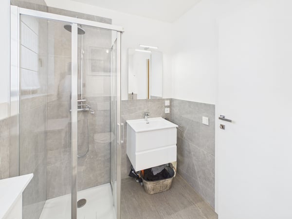 Moderne Gartenwohnung in Massagno – Wohnen mit Komfort und Privatsphäre 19
