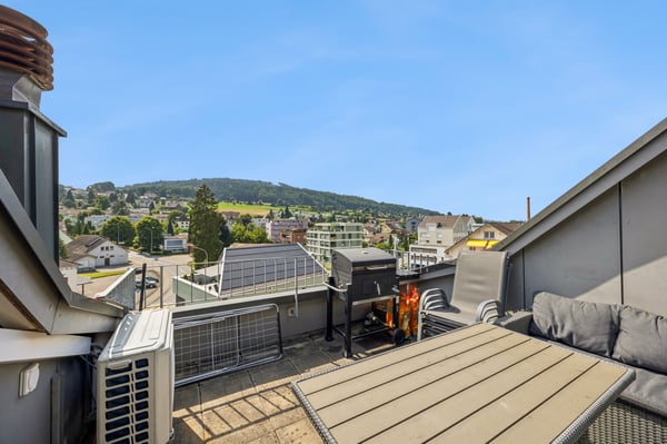 Grosszügige 1.5-Zimmer-Duplexwohnung mit Balkon und Cheminée 1