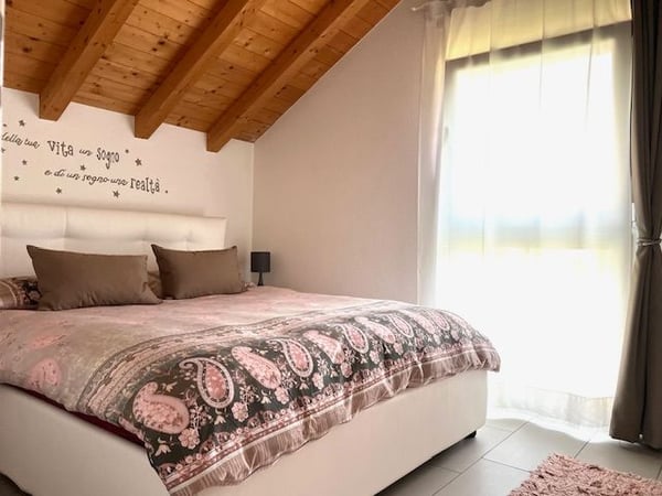 Osogna - villetta in vendita con giardino privato e soffitti a vista 14