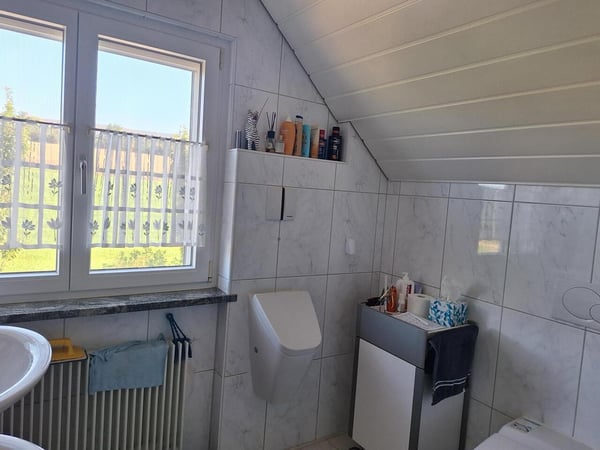 Charmantes Einfamilienhaus mit Garten an sonniger Wohn-/Aussichtslage 12
