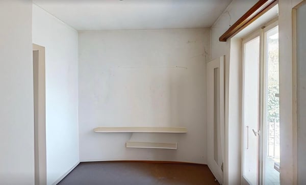 Zentrales Mehrfamilienhaus in Minusio mit Seesicht und Ausbaupotenzial 13