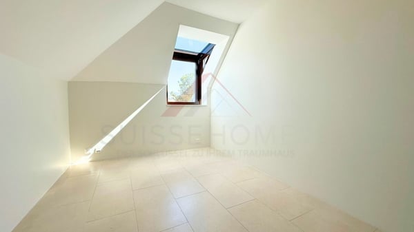 Duplex rénové de 240 m² au dernier étage d'une maison de maître - confort et charme à La Chaux-de-Fonds 7