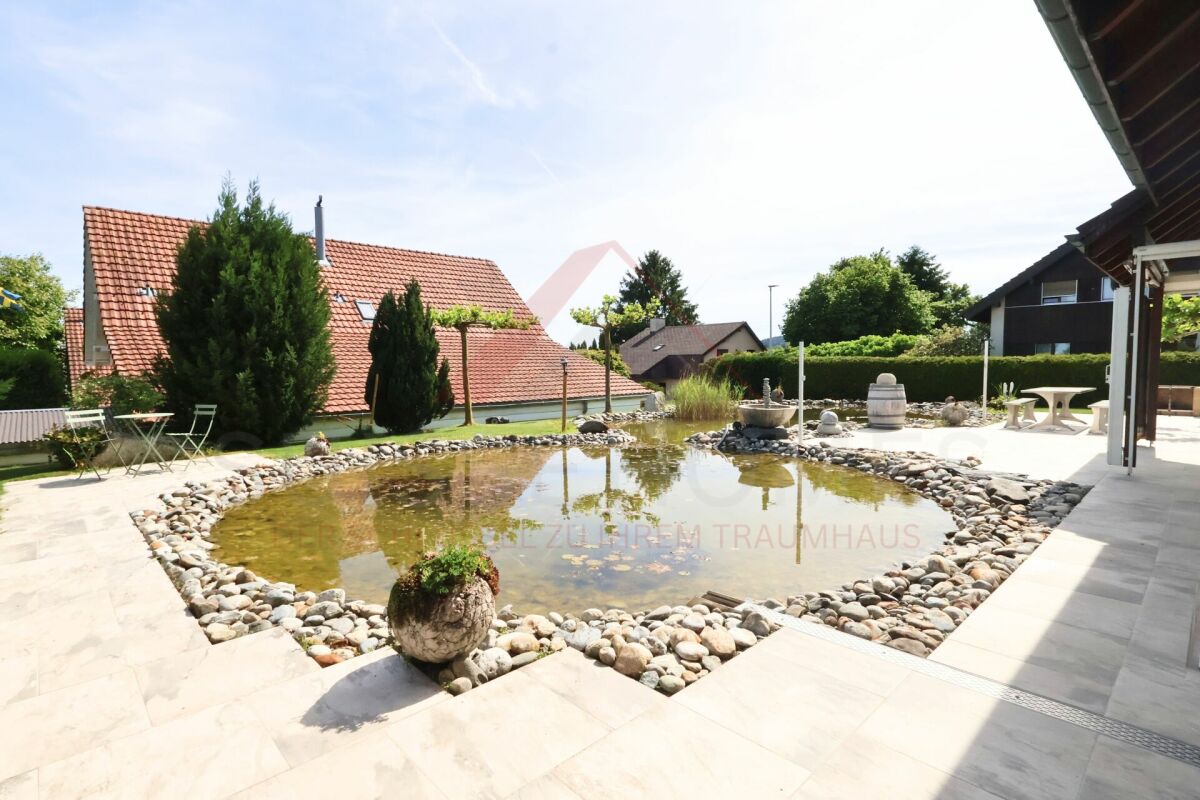 Familienparadies mit traumhaftem Garten & Naturteich in Hagneck