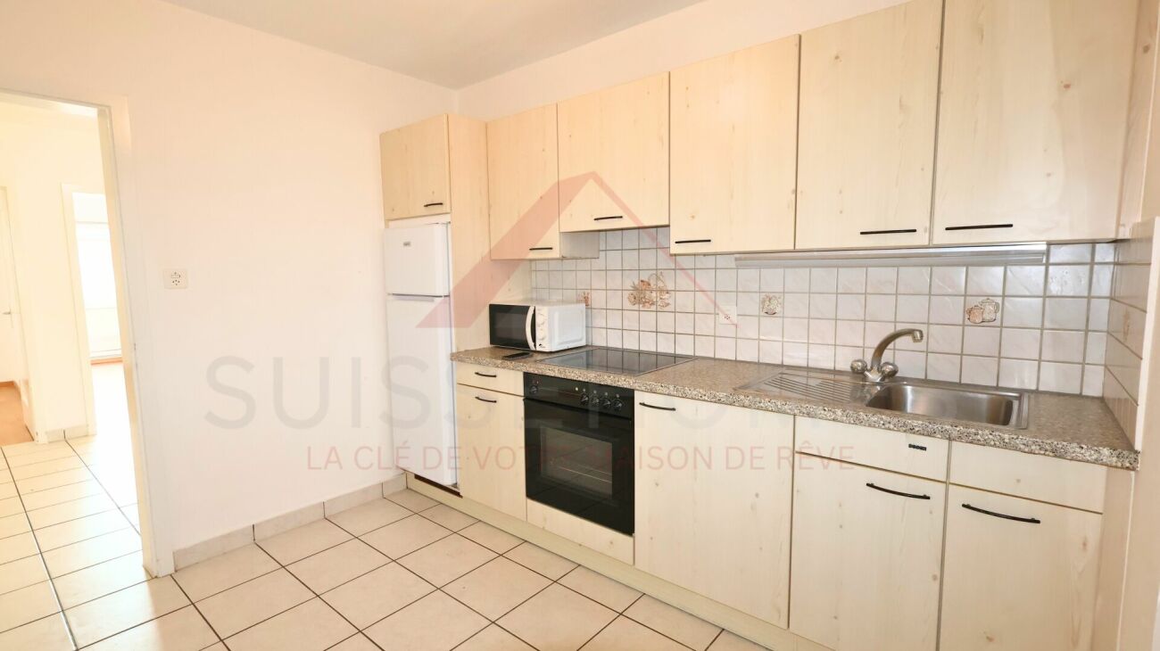 Marly - Appartement 3.5 pièces rénové avec balcon ensoleillé et vue verdoyante
