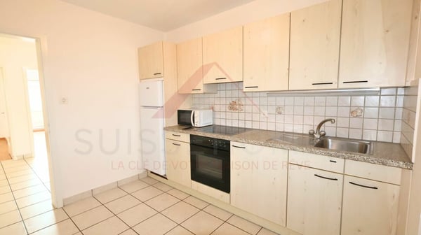 Marly - Appartement 3.5 pièces rénové avec balcon ensoleillé et vue verdoyante 8