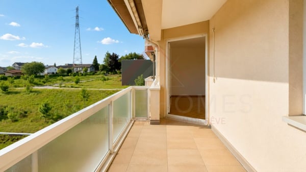 Marly - Appartement 3.5 pièces rénové avec balcon ensoleillé et vue verdoyante 11