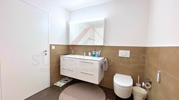 Exklusive 5.5 Zimmer Maisonette mit Designküche, Loggia und Minergie Standard 16