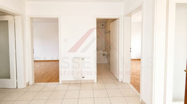 Marly - Appartement 5.5 pièces rénové avec balcon ensoleillé et vue verdoyante 7