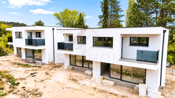 Villa jumelée moderne de 3.5 pièces avec jardin à Belfaux 1