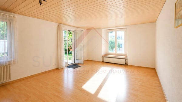 Vielseitiges Mehrfamilienhaus mit drei Wohneinheiten und attraktiven Gewerbeflächen 3