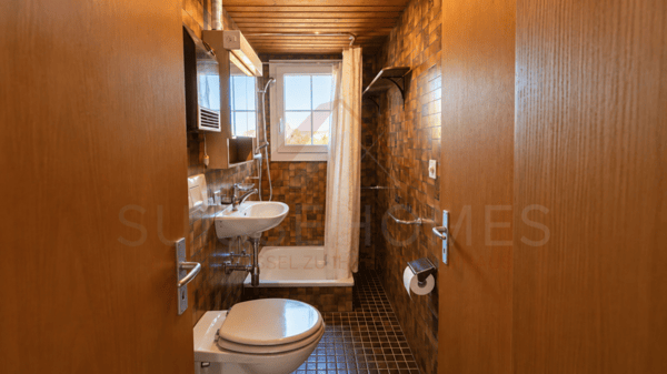 Charmantes 5.5-Zimmer-Chalet mit 2 Wohneinheiten, Schwedenöfen & riesigem Gartentraum in Plasselb 6
