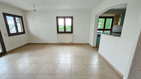 Grosszügiges 2.5-Zimmer-Einfamilienhaus mit Einliegerwohnung im Erdgeschoss 10