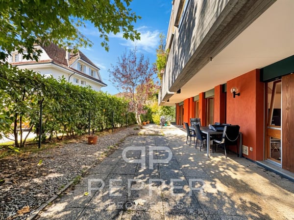 Vaste appartement en rez-de-jardin au coeur de Chailly 1