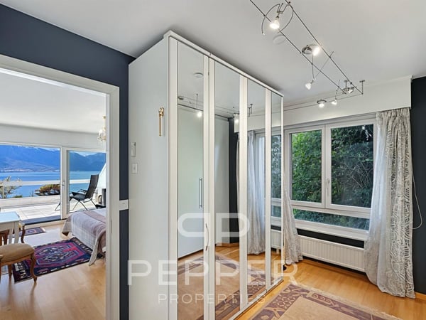 Rare duplex en attique avec vue panoramique sur le Léman et les Alpes 9