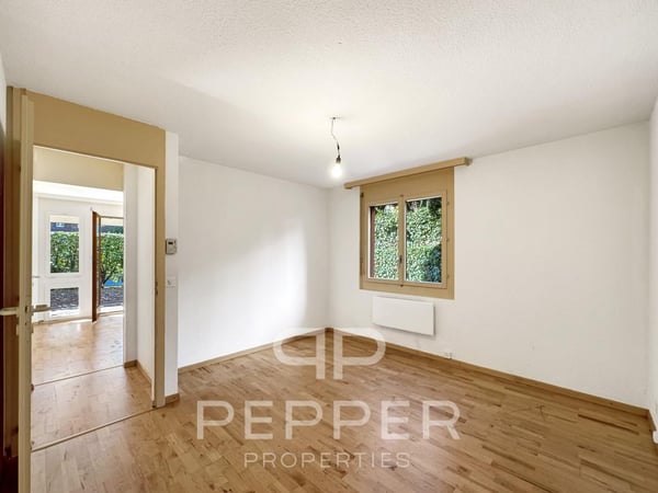Vaste appartement en rez-de-jardin au coeur de Chailly 10