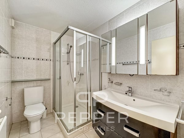 Vaste appartement en rez-de-jardin au coeur de Chailly 9