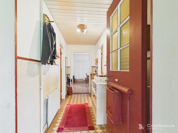 Charmantes 8-Zimmer-Zweifamilienhaus mit Gartenparadies und vielseitigen Nutzungsmöglichkeiten 11