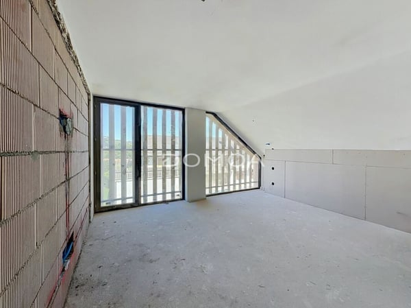 Exceptionnel triplex de 6,5 pièces au coeur d'une ferme rénovée 9