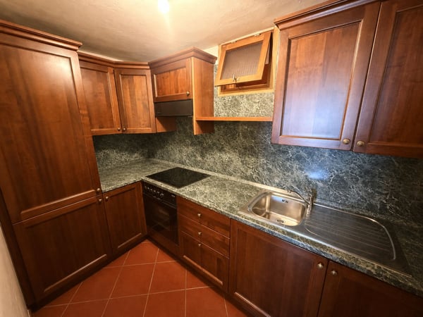 Charming Multi-Family Property with 3 Residential Units in the Heart of Melano 3