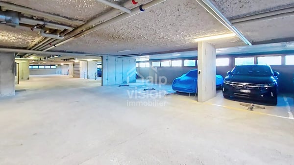 OPPORTUNITÉ RARE: PARKING COUVERT AU CENTRE DE VEYSONNAZ 4