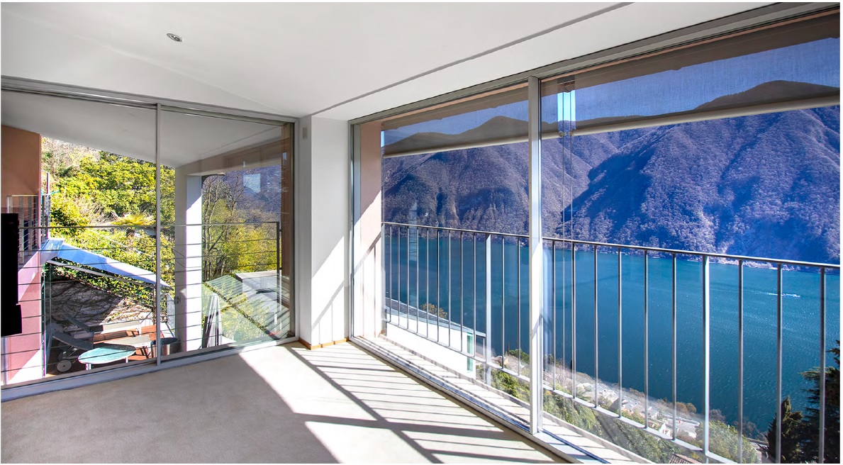 large terrace, panoramic view, glass sliding doors, beige flooring