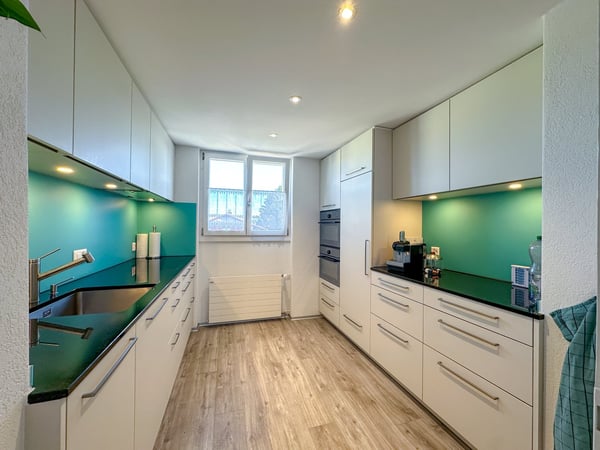 Zweifamilienhaus mit zwei 4-Zimmer Wohnungen im Dorfkern von Wünnewil 6