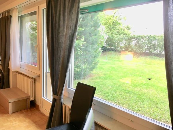 Bright 1-Room Garden Apartment with Balcony and Beautiful View into the Green – Zürich Witikon 3