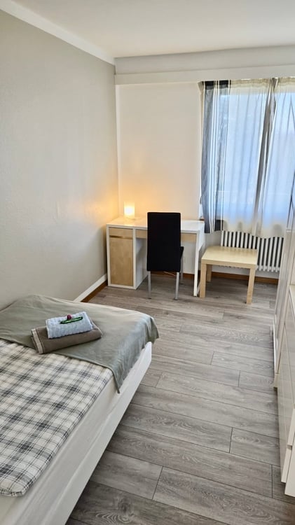 Quiet single room in a shared business apt with a large terrasse and view 2