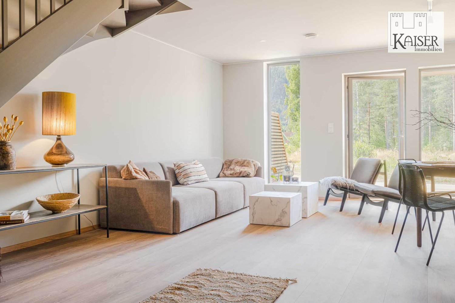 L-shaped couch, side table, table, chairs, floor lamp, shelf, rug, double doors to balcony