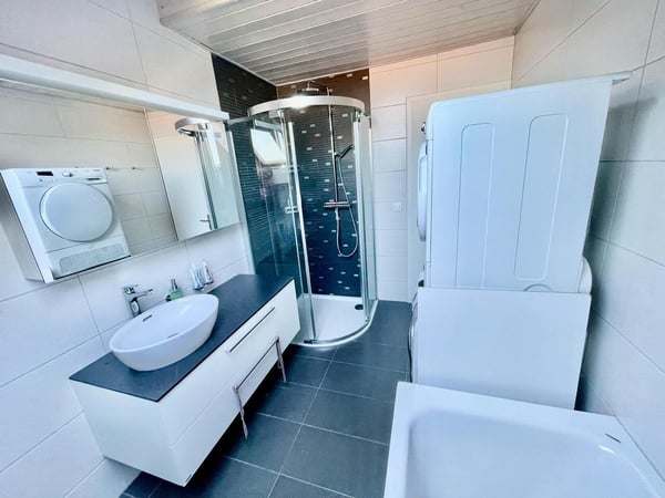 A VENDRE APPARTEMENT EN TRIPLEX DE 130M2 HAB. AU CENTRE D'ECHALLENS 11