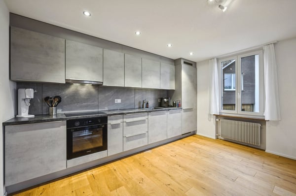 Modern renoviertes Mehrfamilienhaus mit drei Einheiten in ruhigem Quartier 5