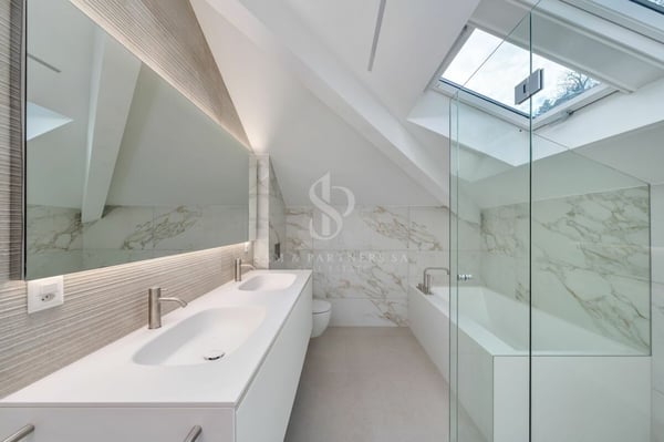 Attico duplex con vista lago 17