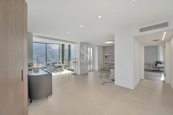 Attico duplex con vista lago 9