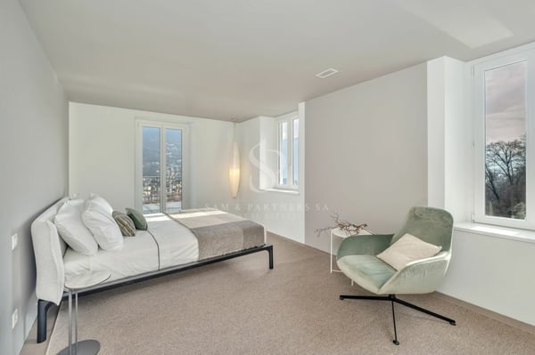 Attico duplex con vista lago 16
