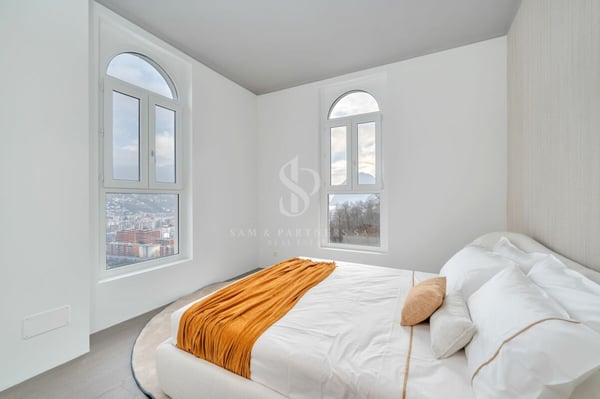 Attico duplex con vista lago 12