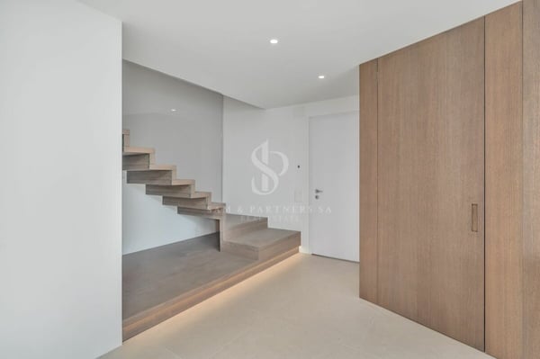 Attico duplex con vista lago 11