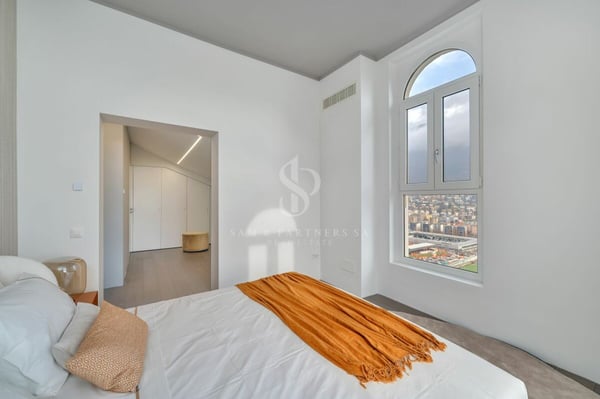 Attico duplex con vista lago 13