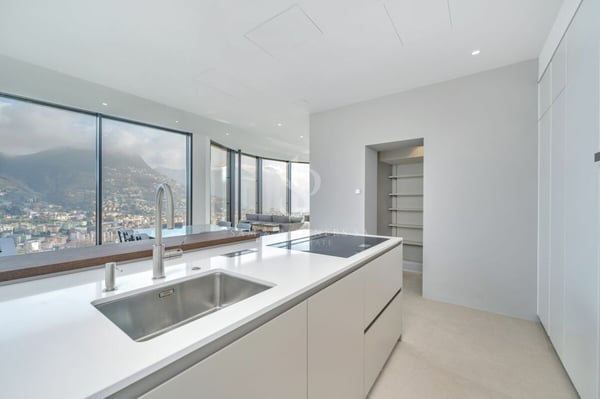 Attico duplex con vista lago 8