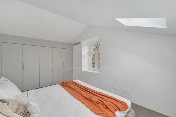 Attico duplex con vista lago 18