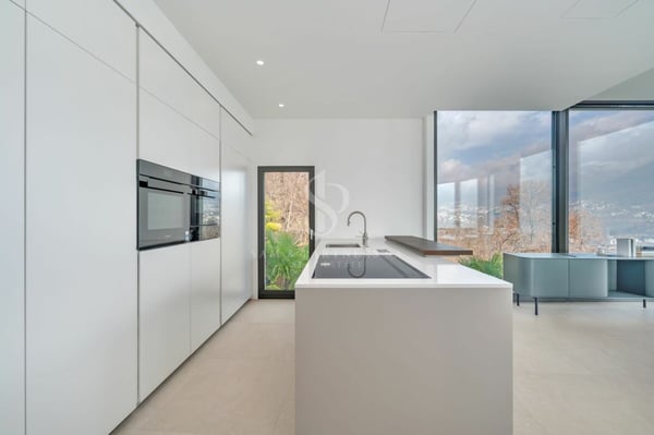 Attico duplex con vista lago 7